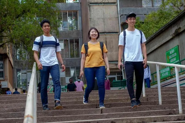 International students walking from the school of Education